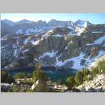 SE across Midnight Lake: left distance is Pt. 13,280 and Mount. Thompson (13,494 ft); square top summit and sunny spire with snow bEast northeastath are both ca. 13,000 ft; twin peak on right with snowy face is Pt. 13,364 ftfrom ca. 11,300'