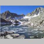 S across Blue Heaven Lake; Pt. 12,760 ft on left Pt. 13,332 ft on right Mount Haeckel (13,418 ft) in center