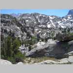same pond as above with Pt. 13,000 ft (square top) and Picture Peak (13,120 ft) in background skyliNortheast