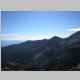 Still ascending. Higher yet. Bad focus telephoto looking east.