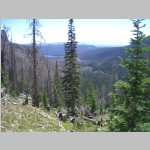 Jim hammering up the trail (Upper Big Creek Lake is in the background)