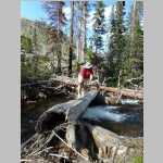 Jim crossing Big Creek above Falls
