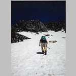 Big Agnes Mtn 16 July 1995, Keith climbing west snowfield on Big Agnes