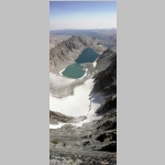 Long view to the east. Brian laid on his stomach and took the bottom of the shot pointing straight down the dropoff. Glacier Lake again.