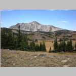 1 of 2 for pano - Lunch break on day hike - looking east toward Medicine Bow Peak (north point) - Crescent lake below