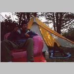 Ted enjoying dinner (?) at base camp Bridger