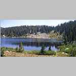 This view is looking ~SE across Eklund Lake.  In the background is the Pole Creek Trail going toward Marys Lake.