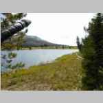 coming back to camp seen in distance across Mirror Lake. Could not reach Donald Lake. Hiked to Marms Lake